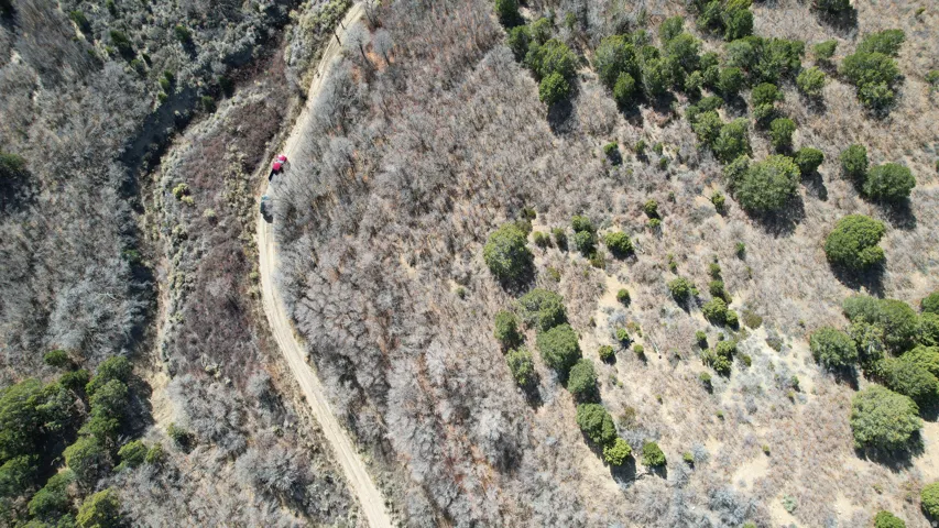 Aerial view of property and surrounding area featuring rural landscape