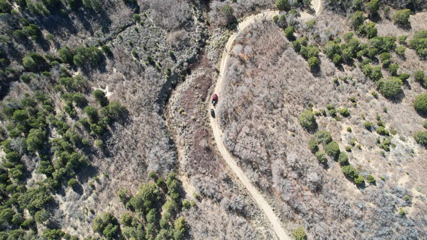 Aerial view of property and surrounding area with rural landscape