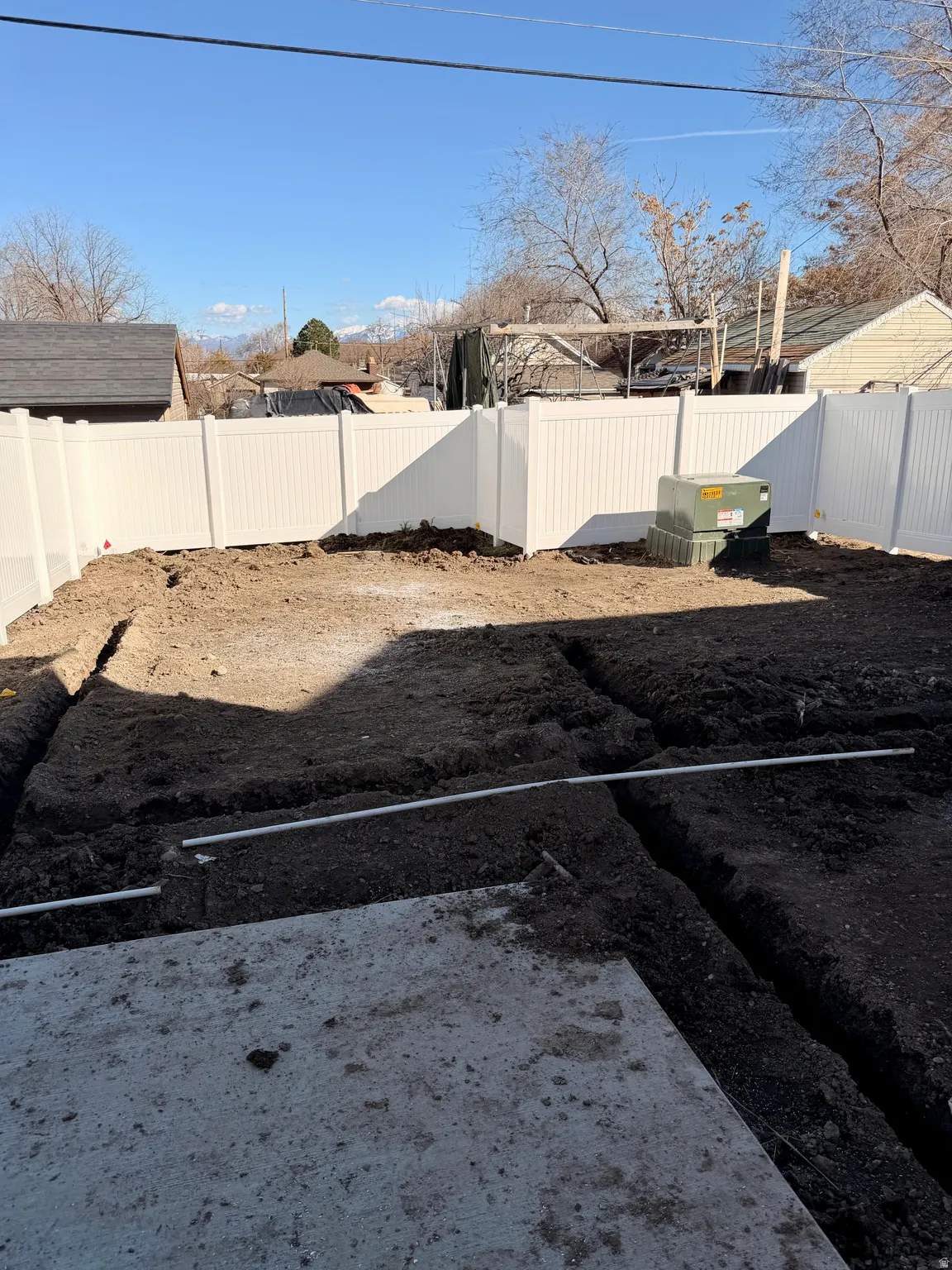 View of fenced backyard