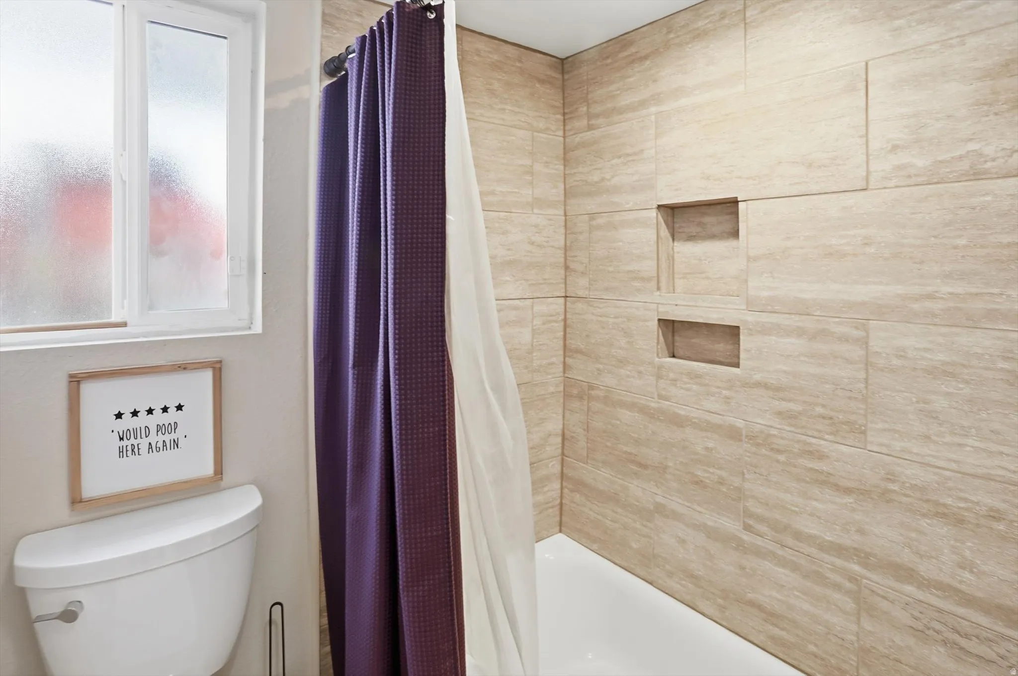 Beautifully tiled shower/tub