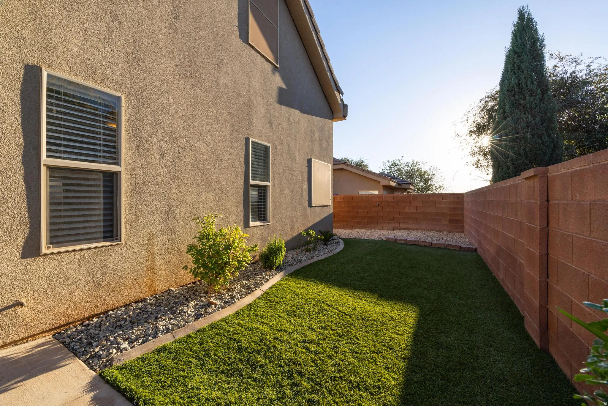 View of fenced backyard