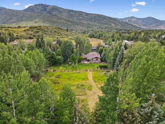 Drone / aerial view of a mountainous background