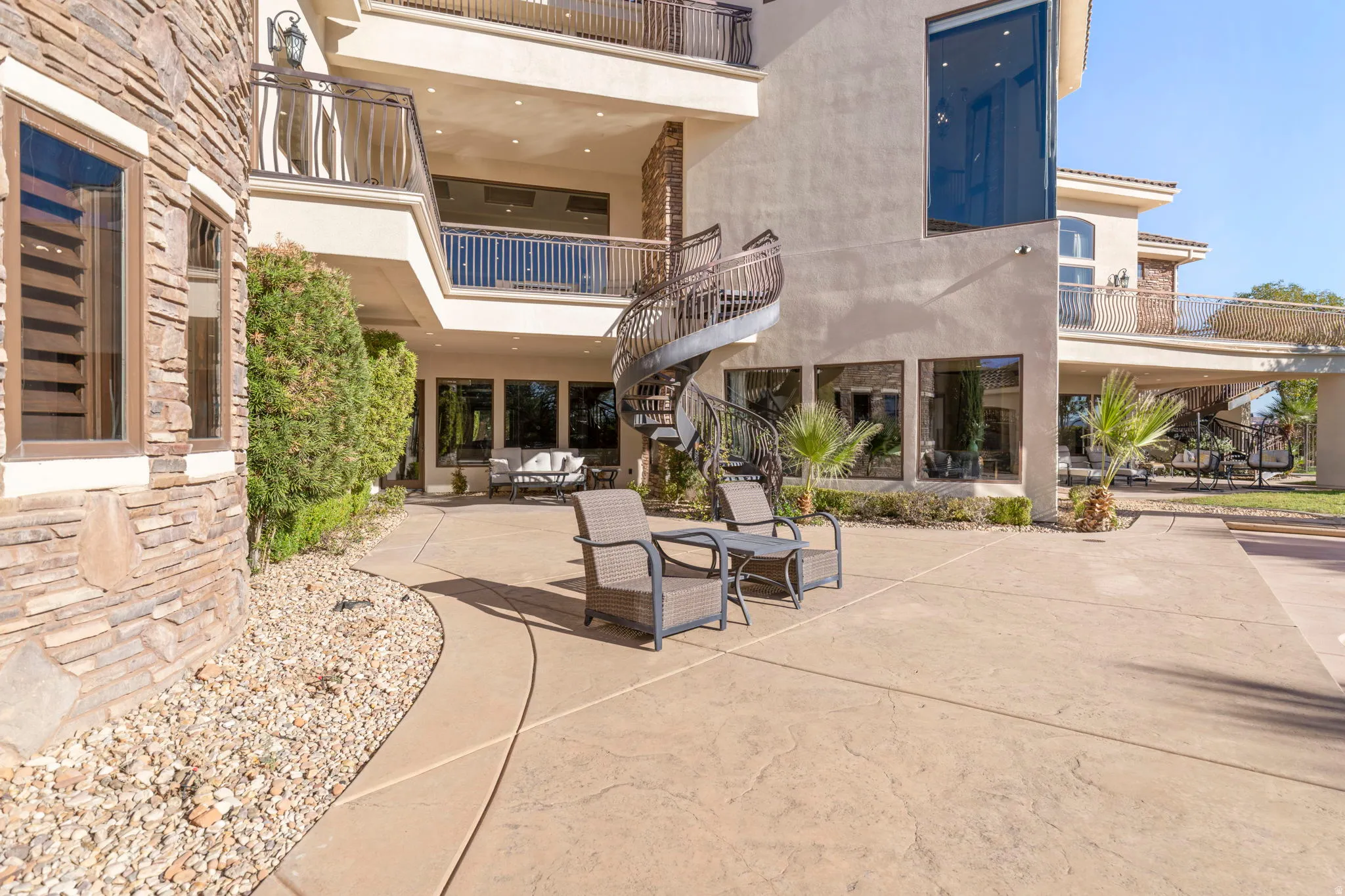 Patio / terrace with a patio and stairway