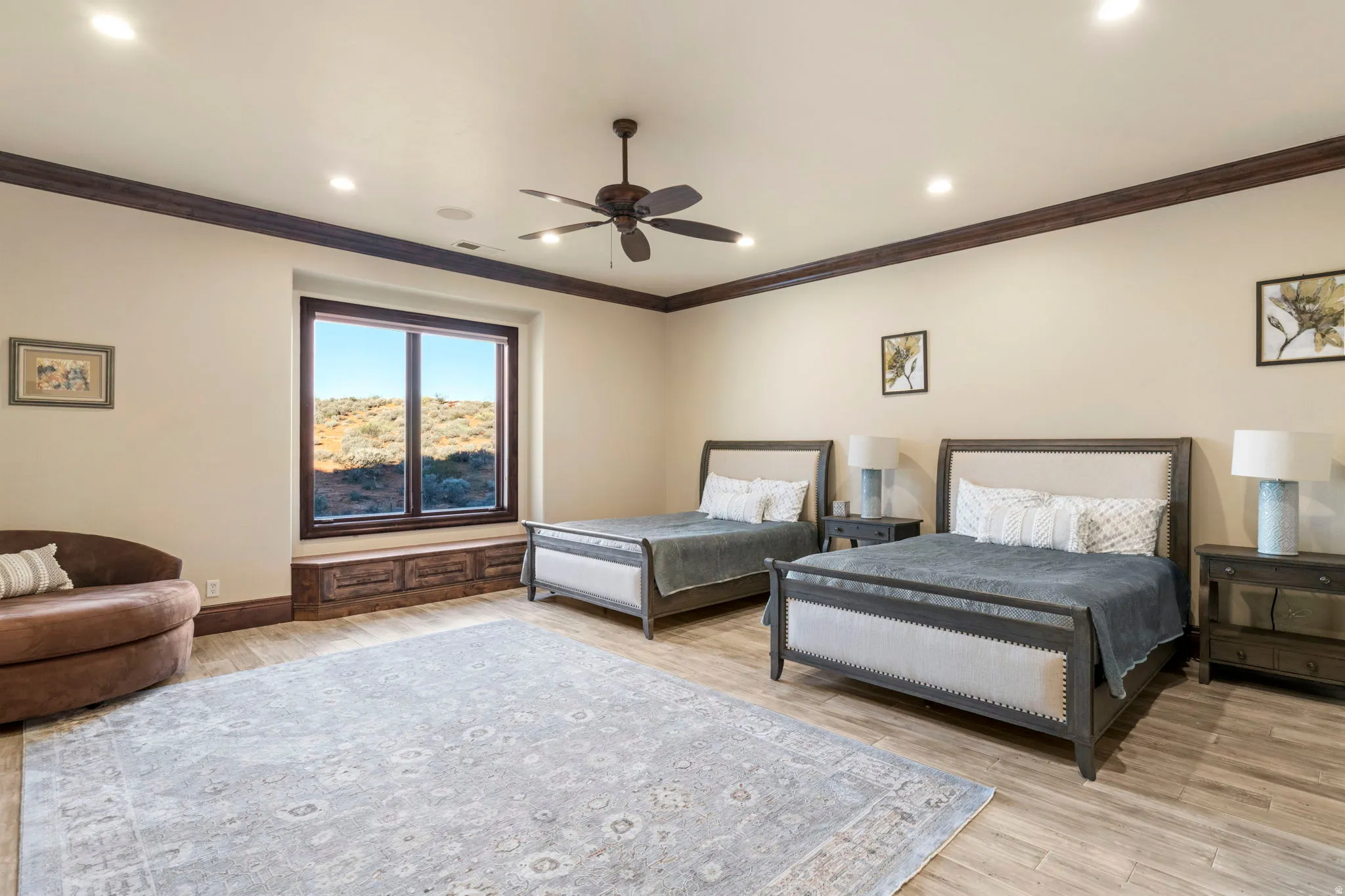 Bedroom with crown molding, a ceiling fan, light wood-style flooring, and recessed lighting
