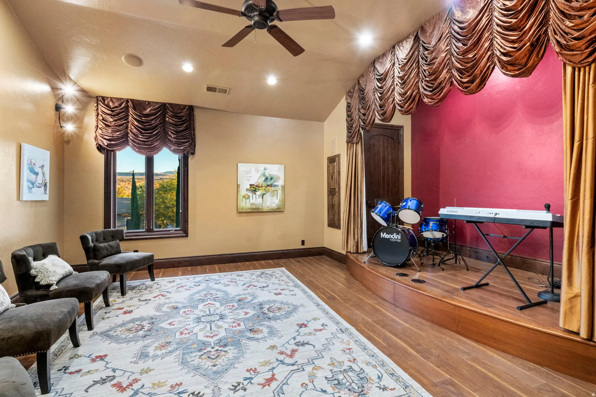 Living area featuring ceiling fan, wood finished floors, and recessed lighting