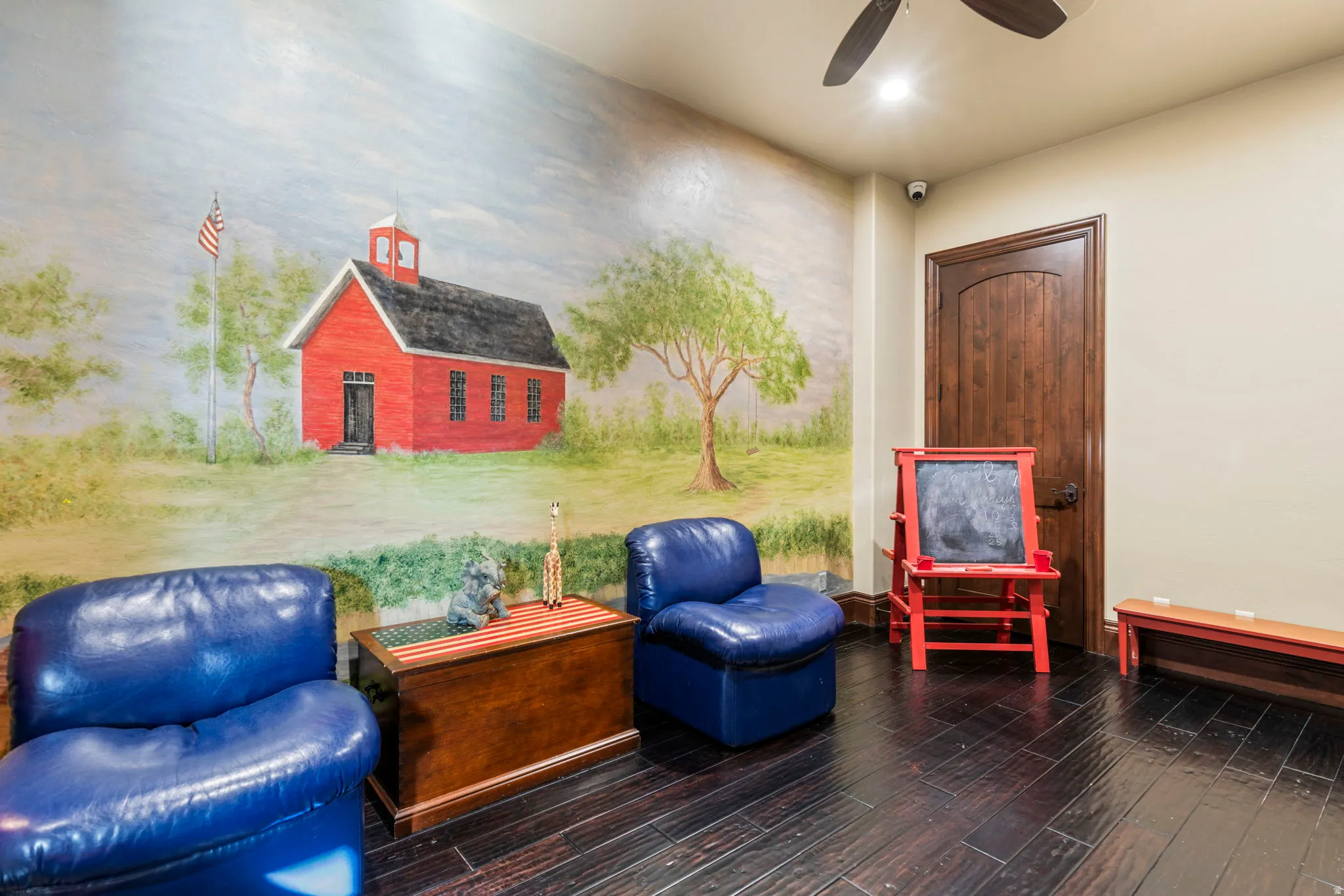 View of patio with a ceiling fan
