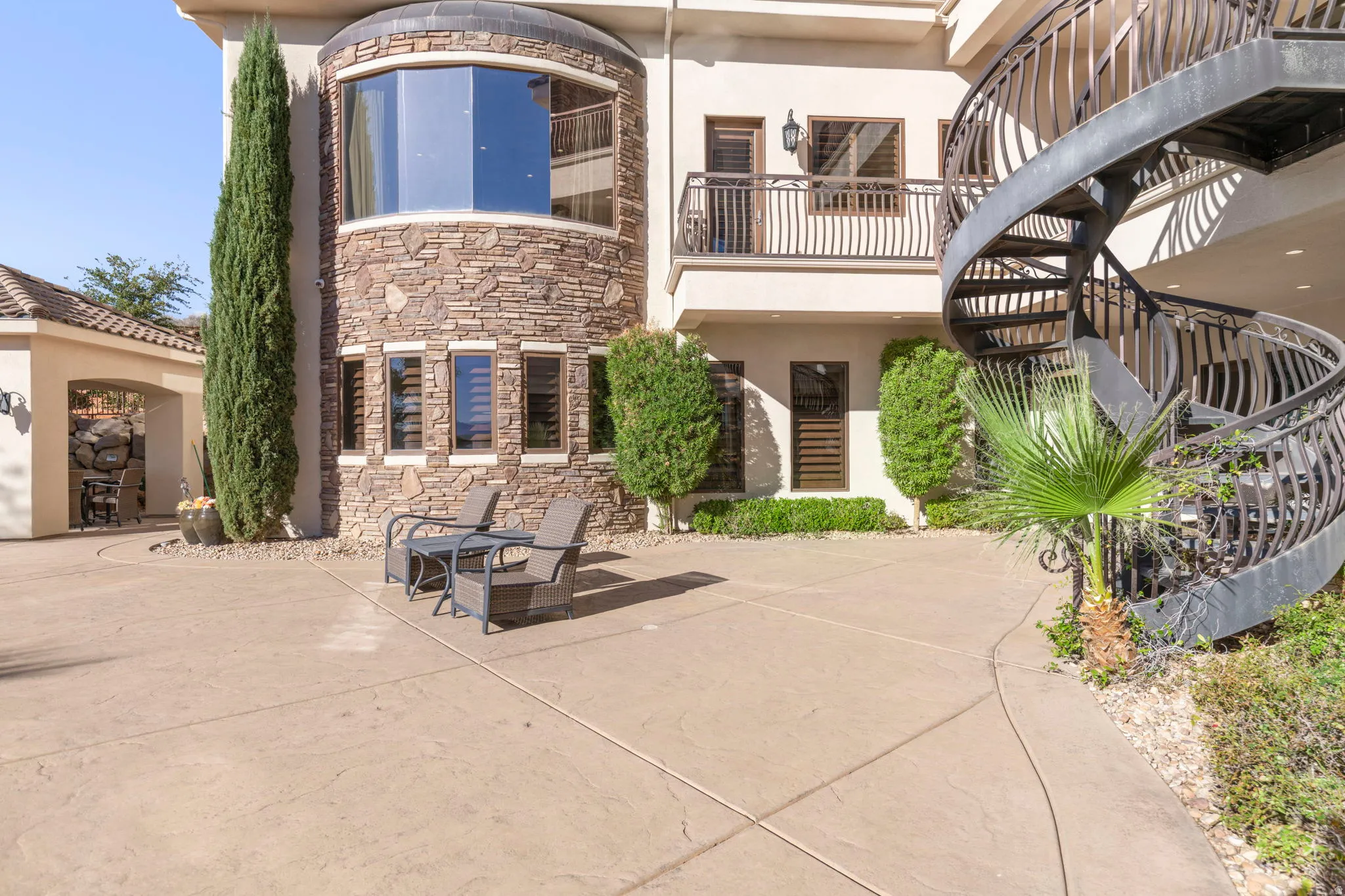 View of property featuring stairs