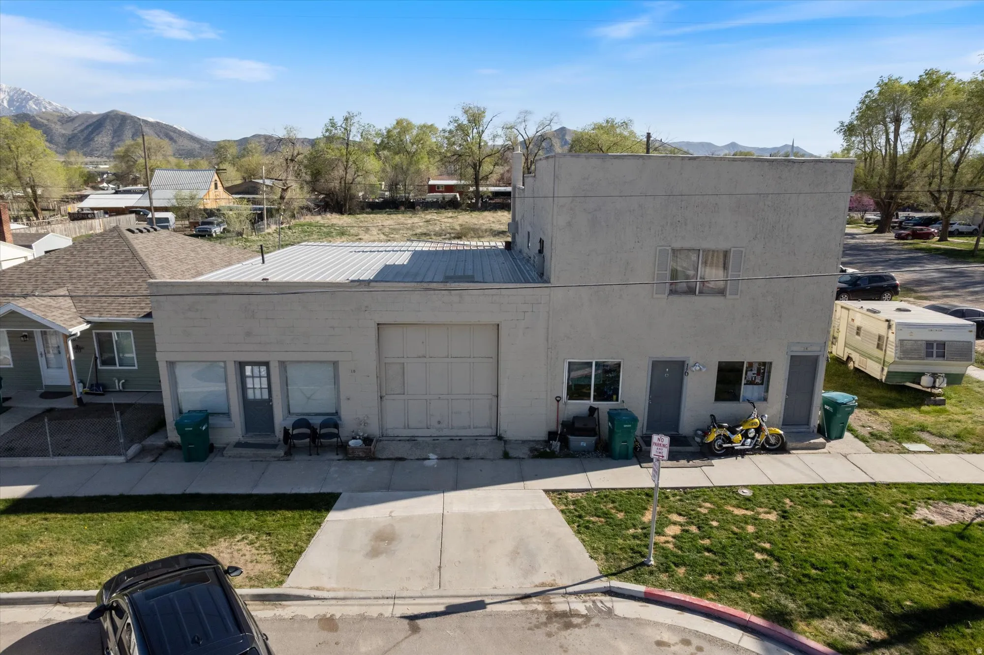 View of front facade featuring a metal roof and a mountain view