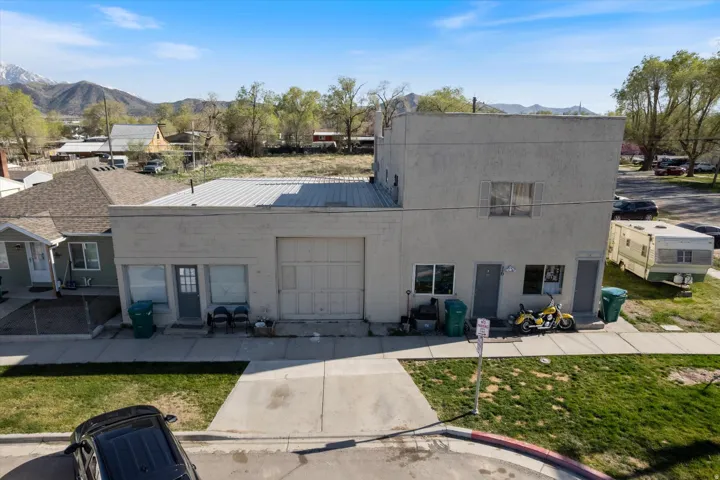 View of front facade featuring a metal roof and a mountain view