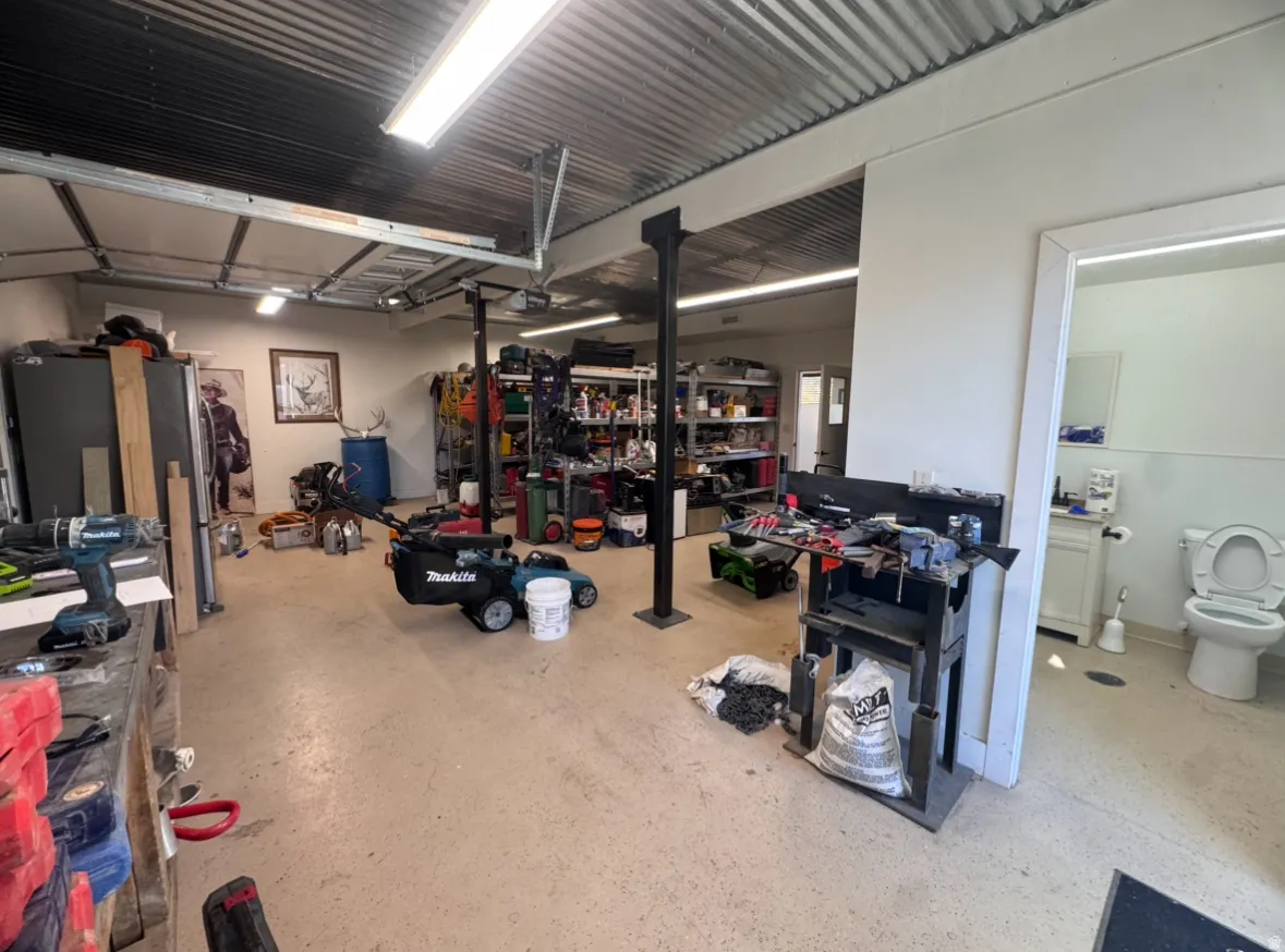 Garage featuring a workshop area