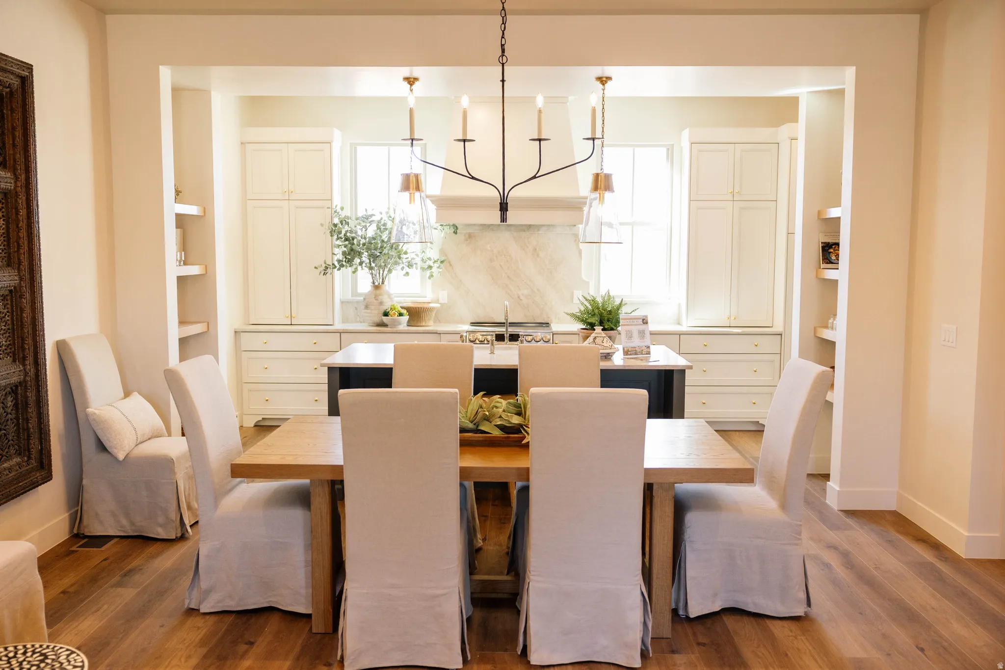 Dining space featuring dark wood-style flooring