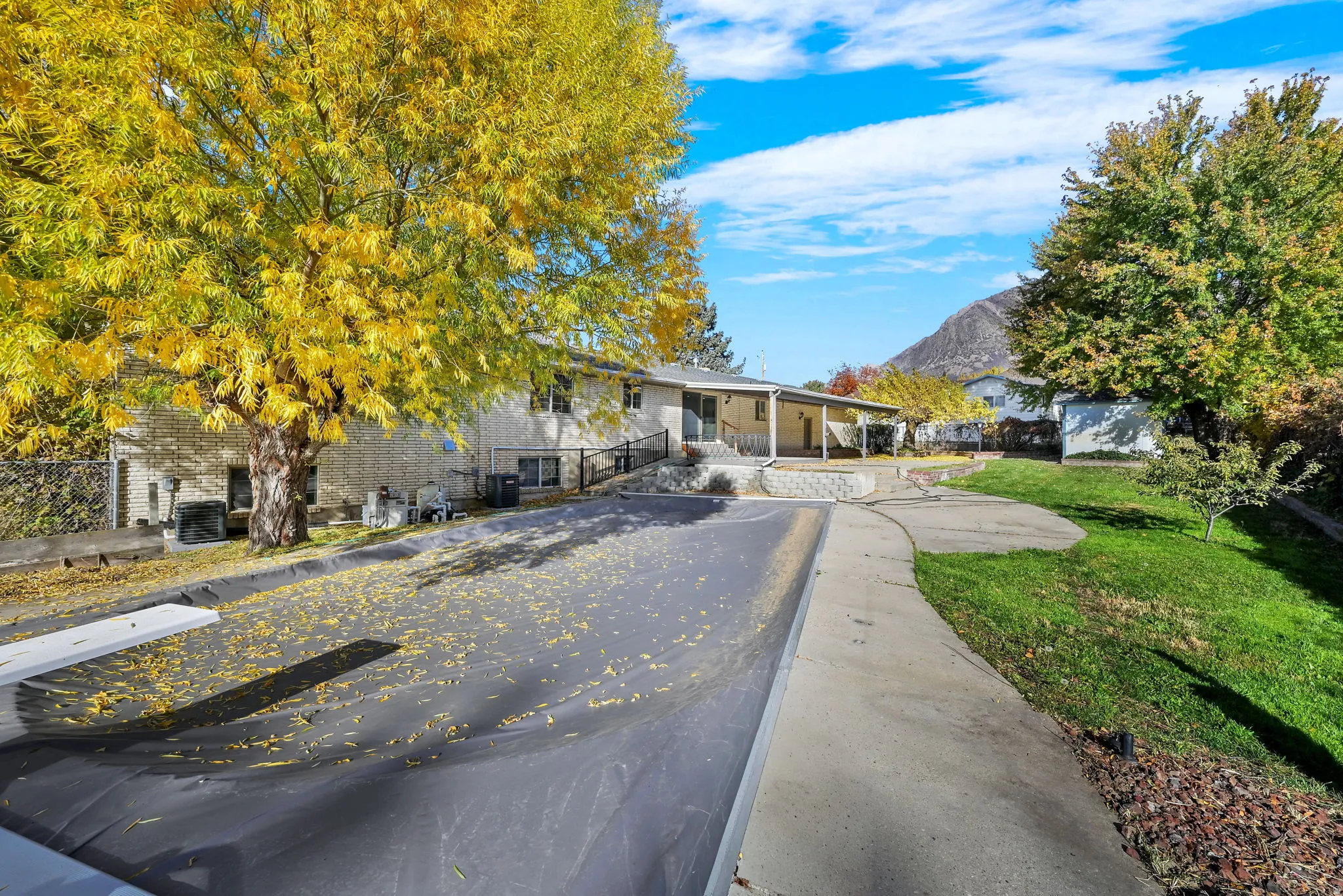 View of front facade featuring a patio and a mountain view