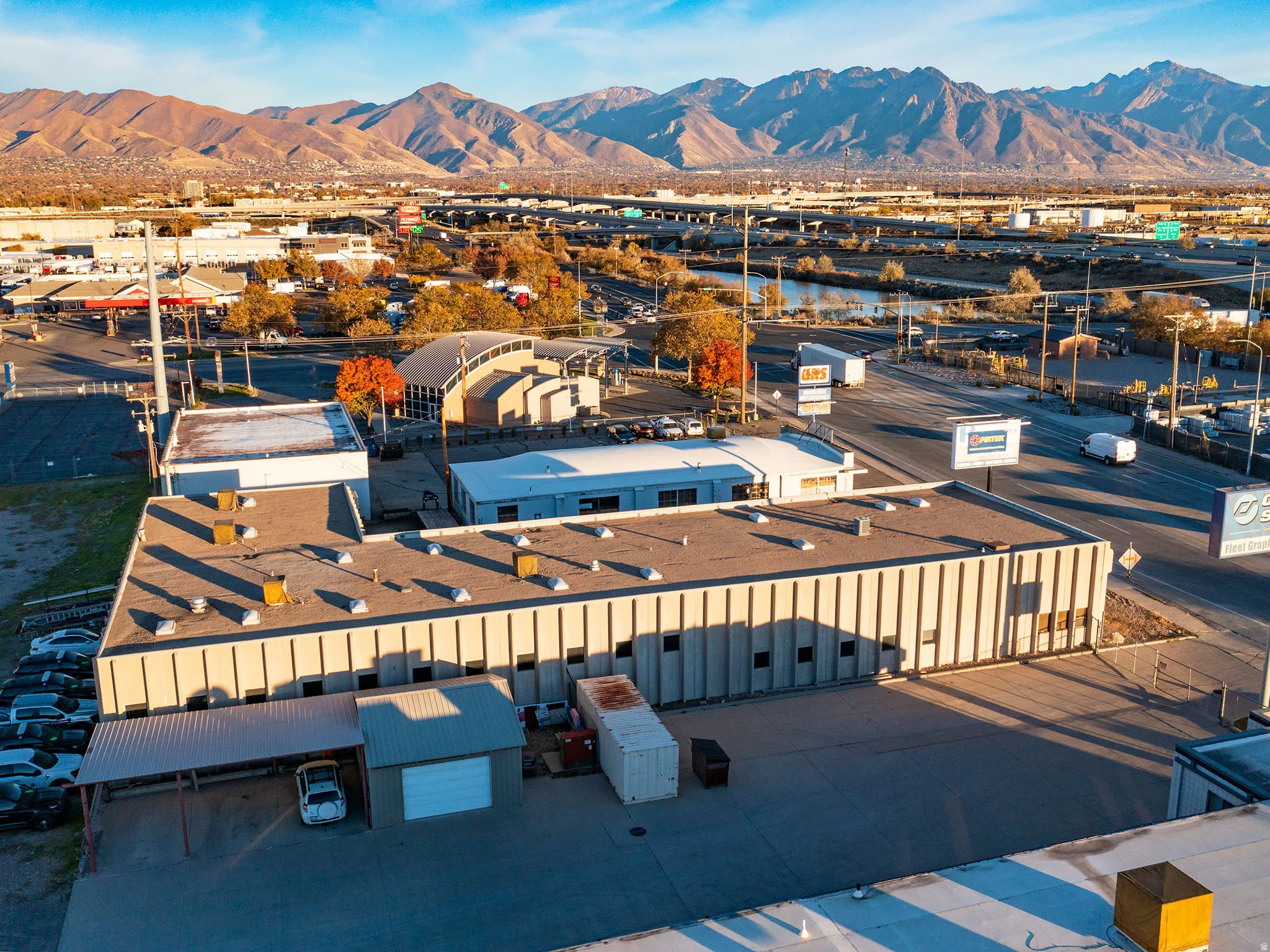 Aerial view of residential area featuring a mountainous background
