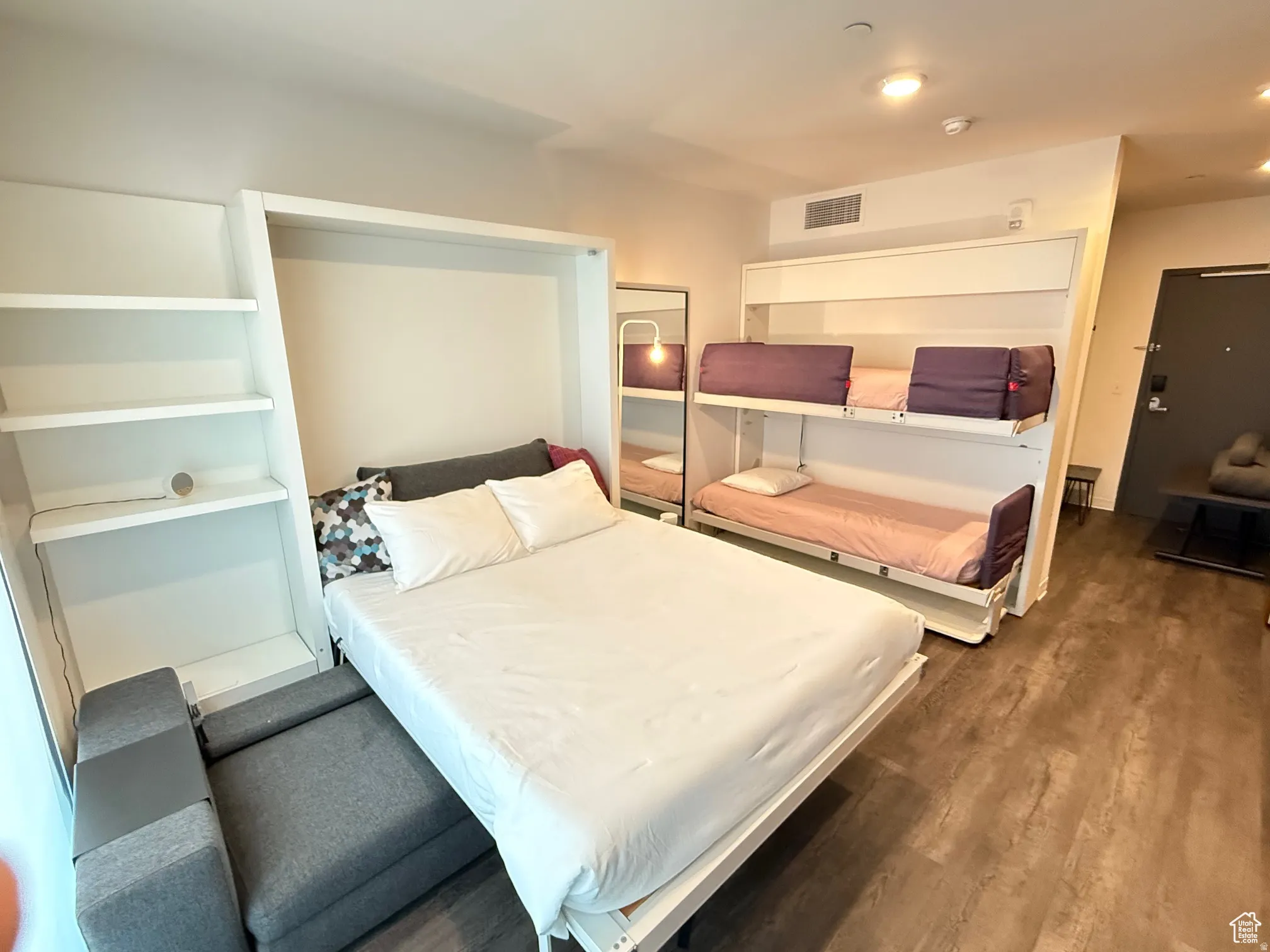 Bedroom featuring wood finished floors