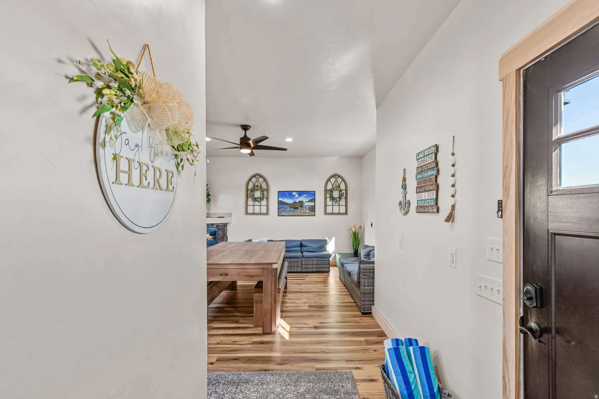 Hall with recessed lighting and light wood-style floors