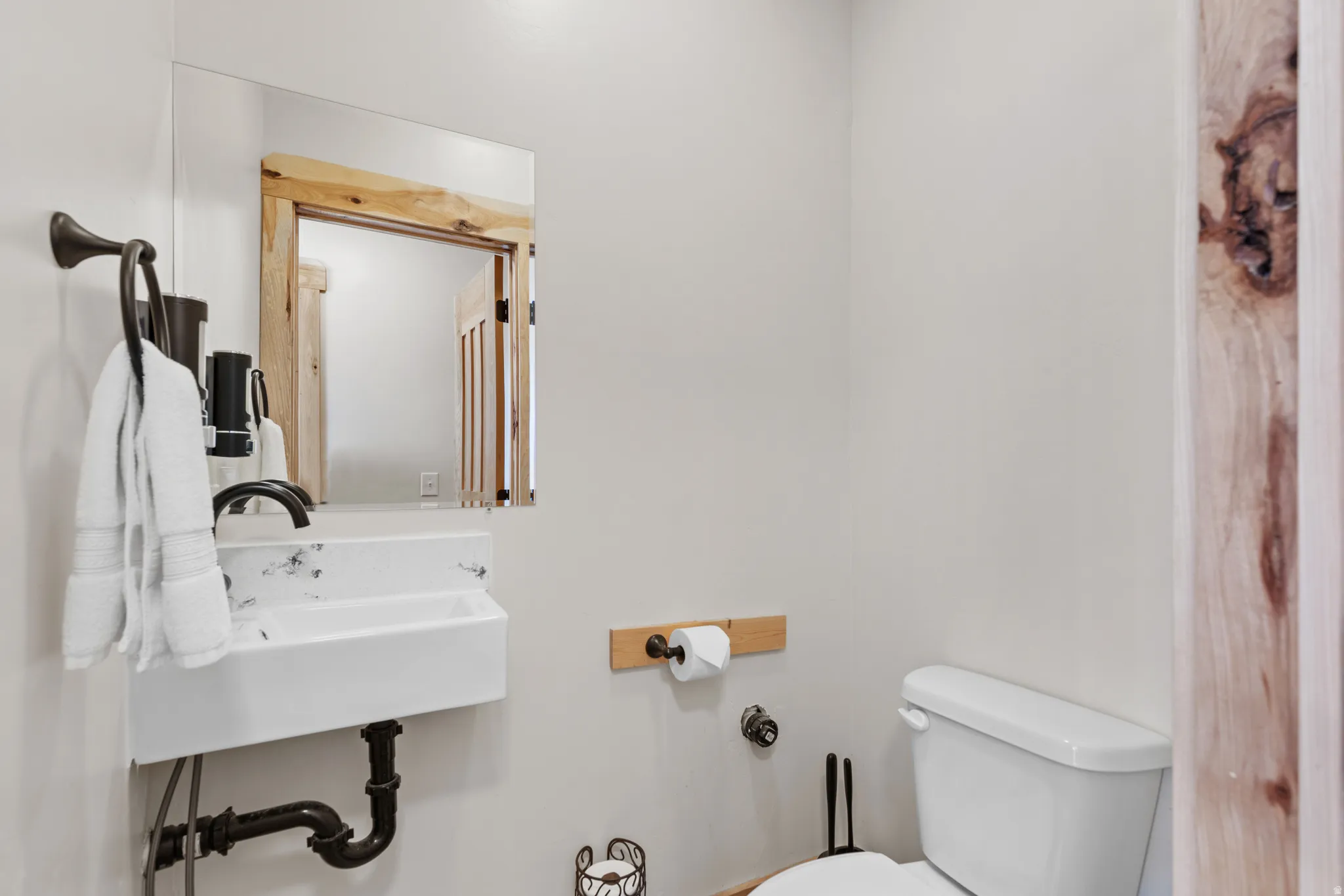 Half bathroom featuring toilet