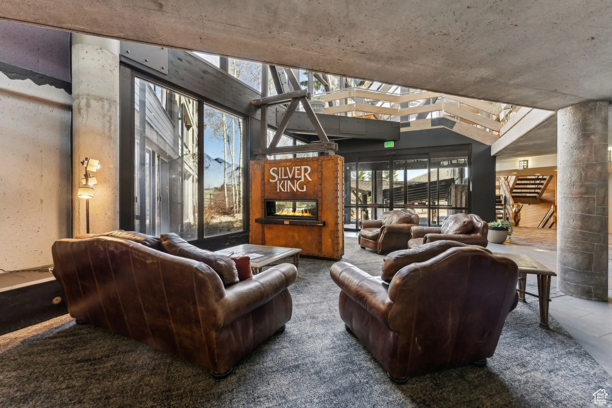 Living area featuring a multi sided fireplace