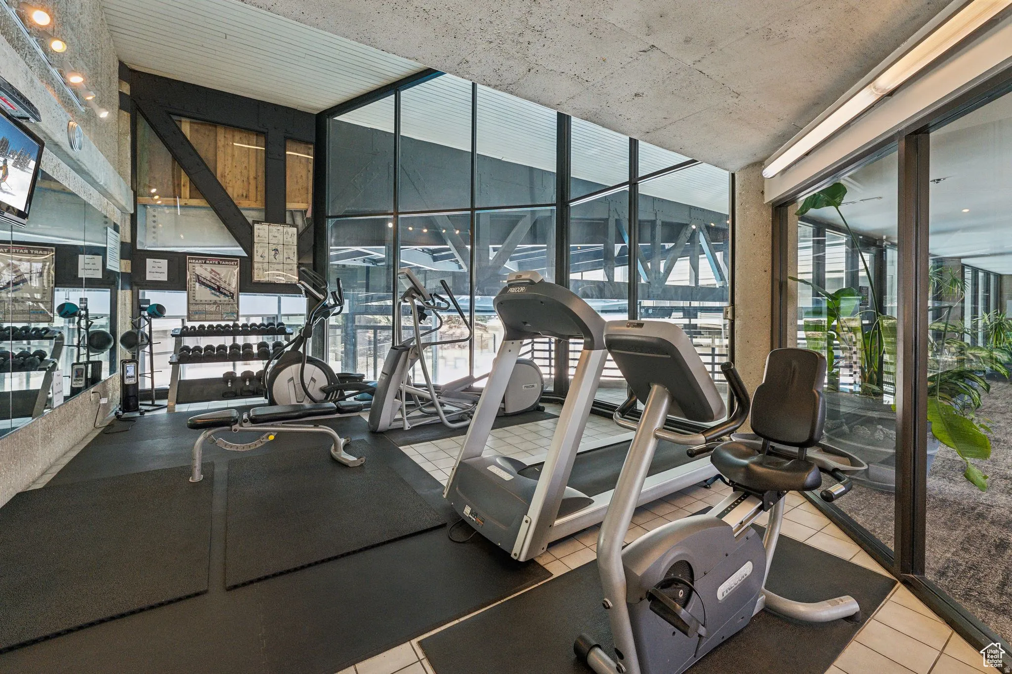 Exercise room featuring a wall of windows