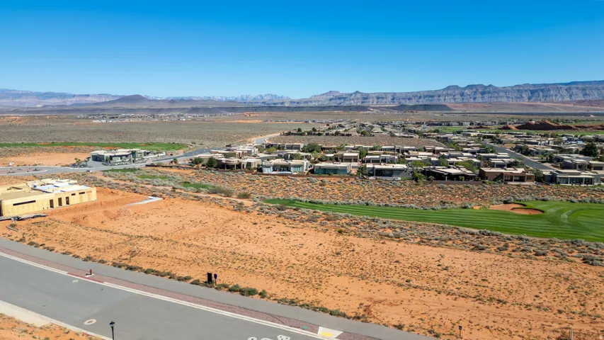 Aerial view of residential area with a mountain backdrop