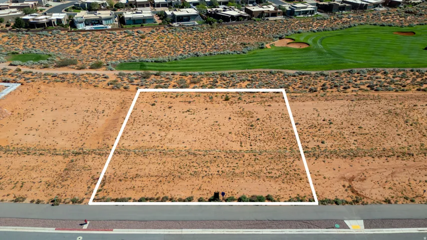 Aerial perspective of suburban area featuring property boundaries highlighted