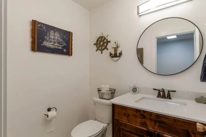 Bathroom featuring vanity and toilet