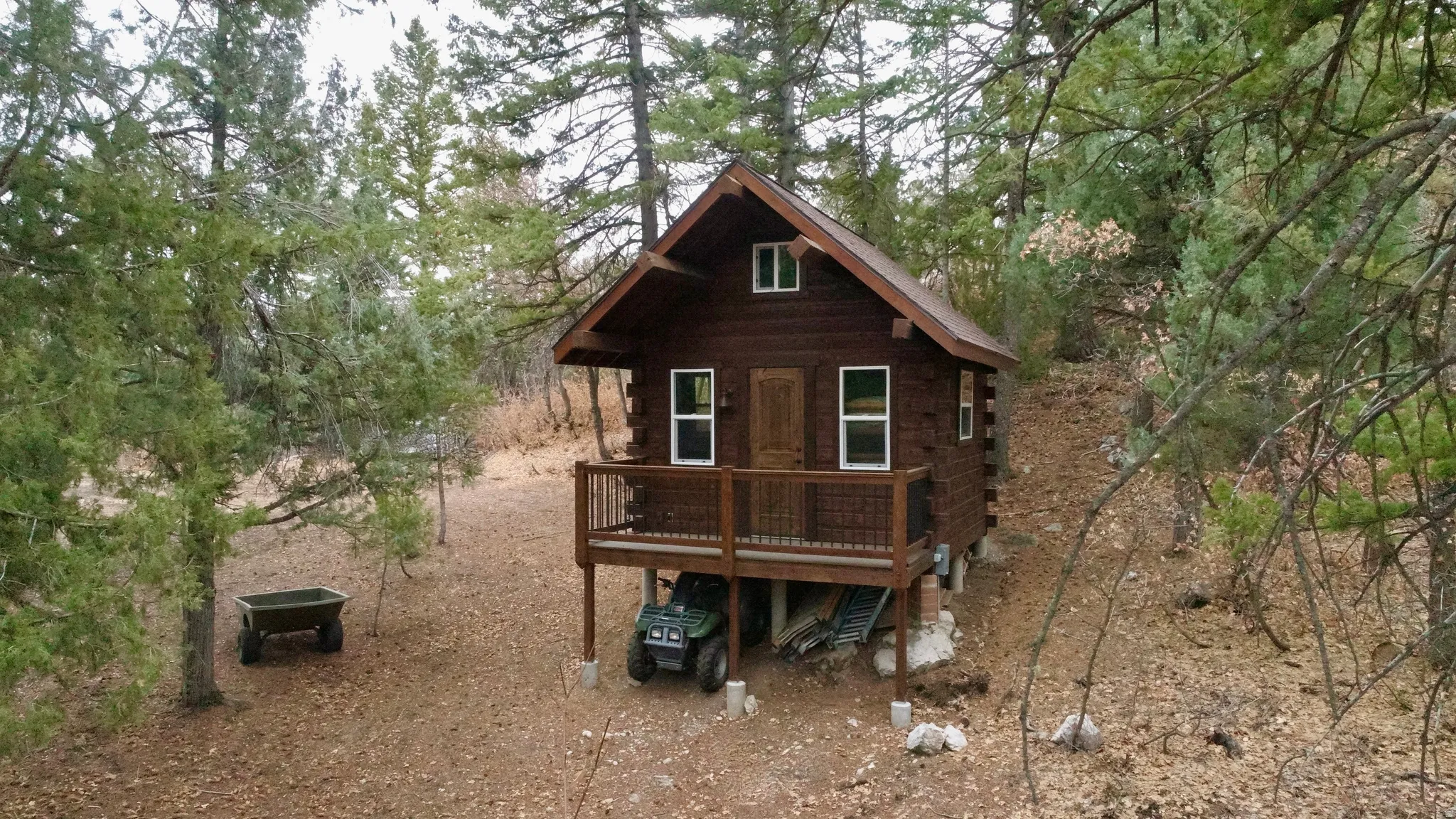 View of side of property featuring a deck