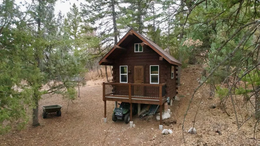 View of side of property featuring a deck