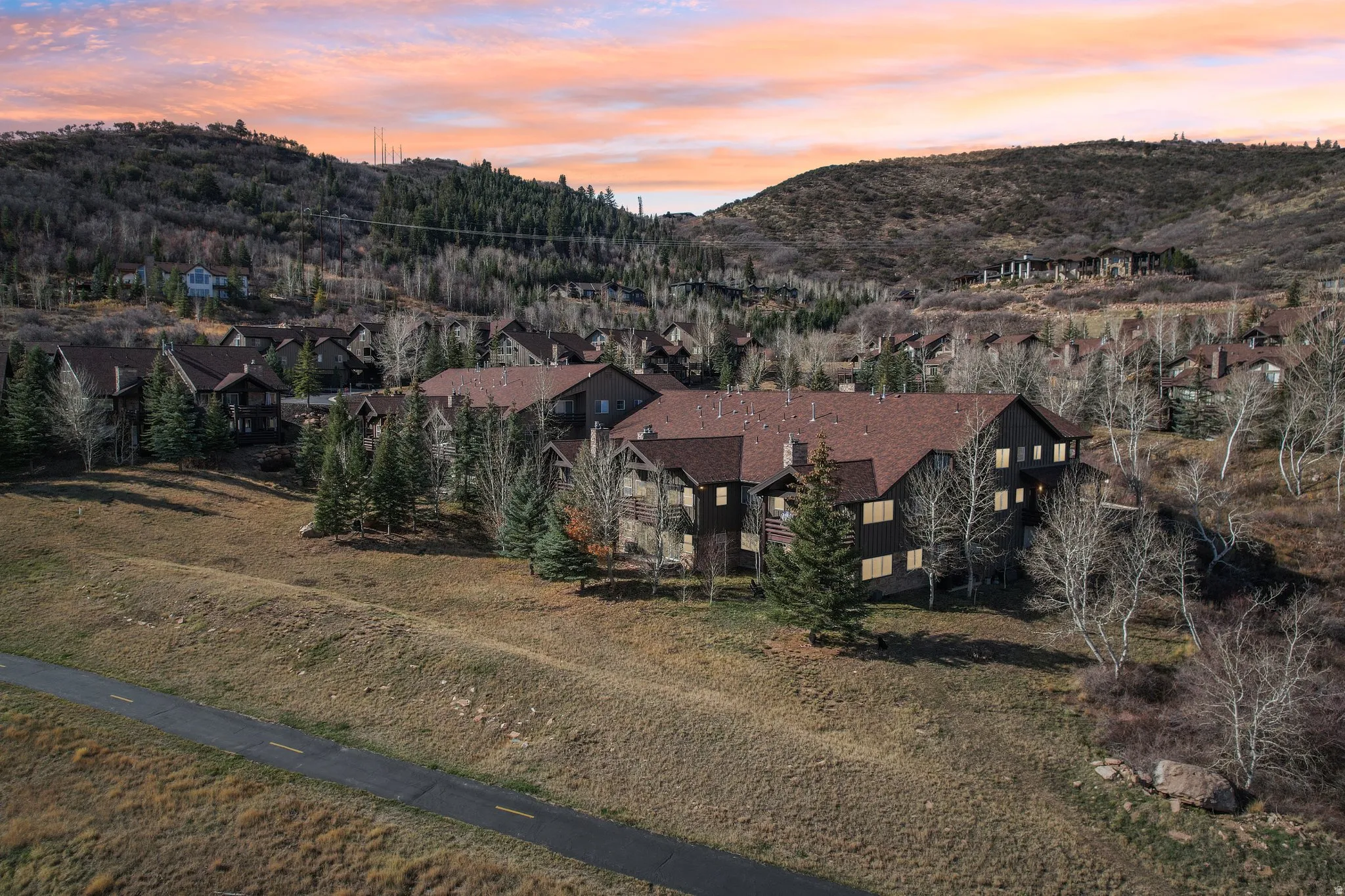 View of mountain background featuring nearby suburban area