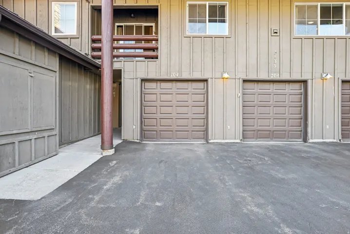 Garage featuring driveway