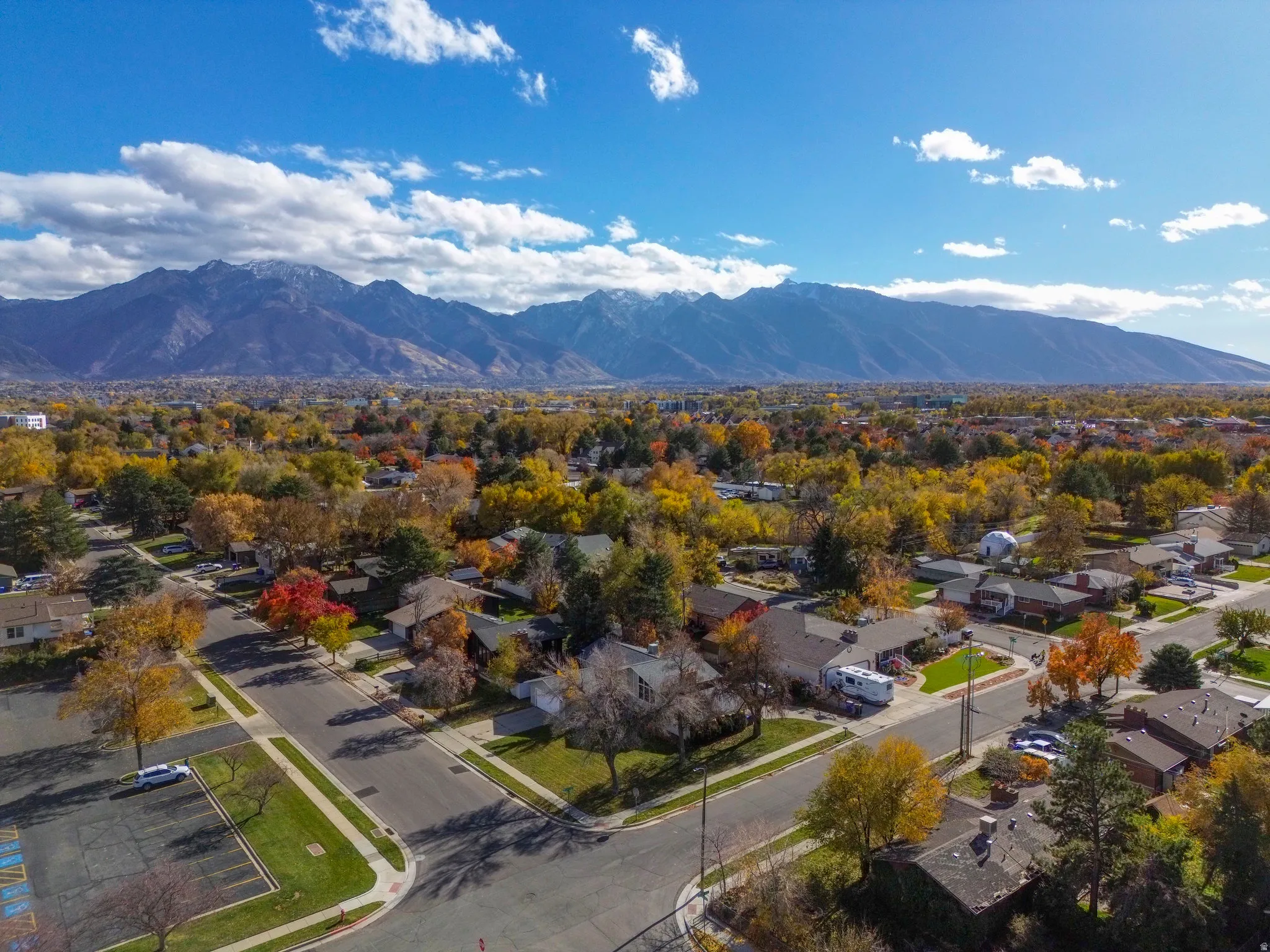 Aerial perspective of suburban area featuring mountains