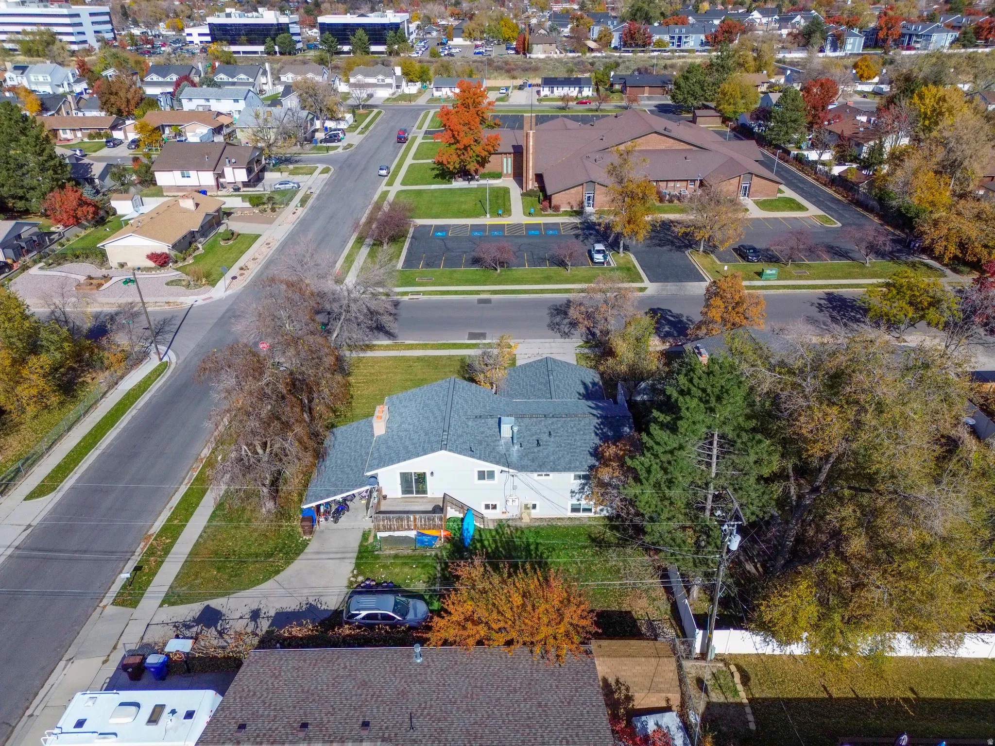 Aerial view of property's location featuring nearby suburban area
