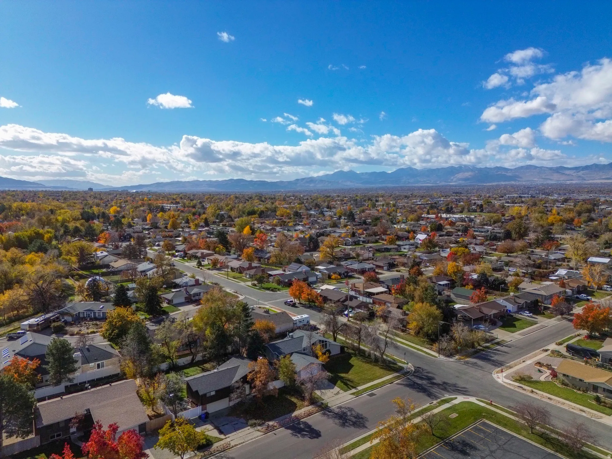Aerial view of residential area with a mountainous background