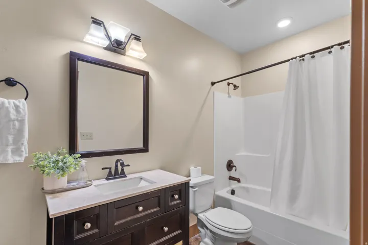 Full bathroom featuring vanity and shower / tub combo
