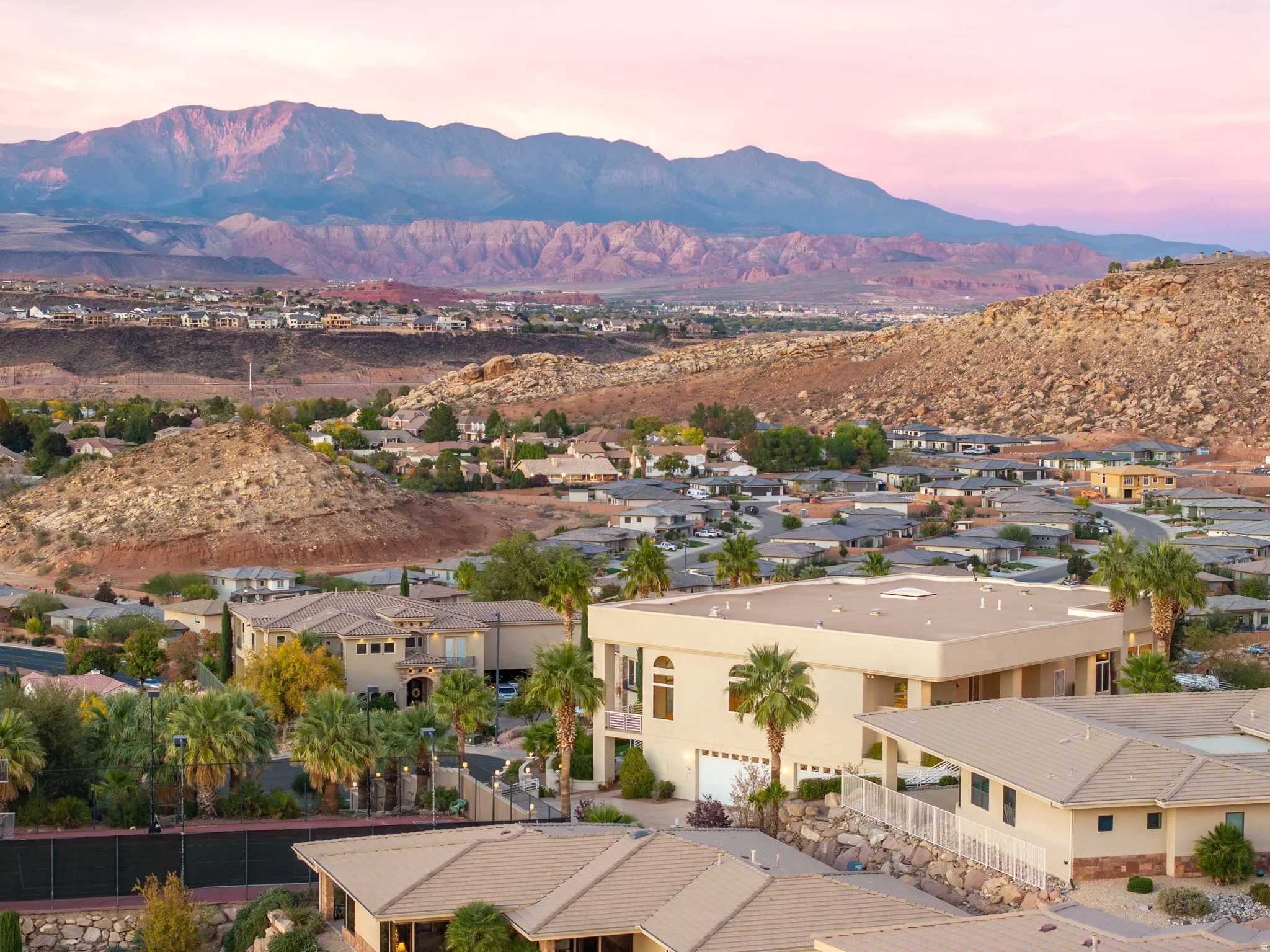 View of mountain backdrop with nearby suburban area