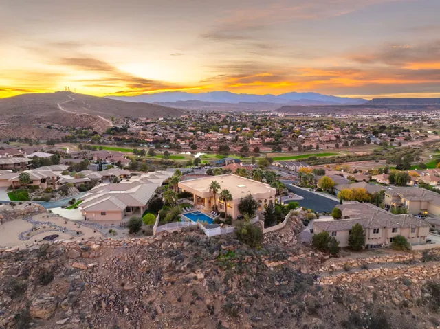 Aerial view at dusk of a residential view and a mountain view