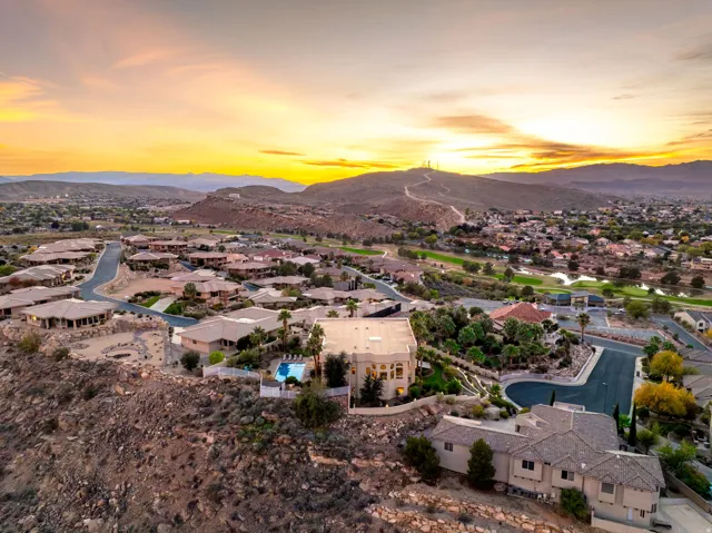 Aerial view at dusk of a residential view and a mountain view
