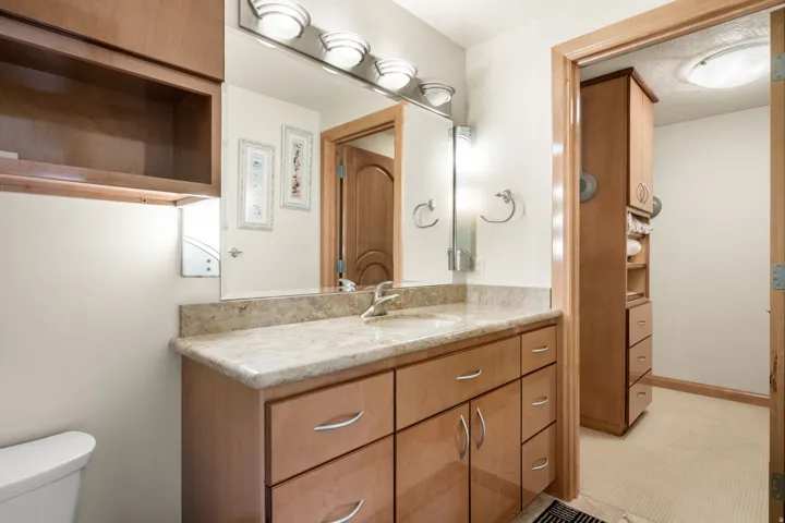Half bath with vanity and toilet