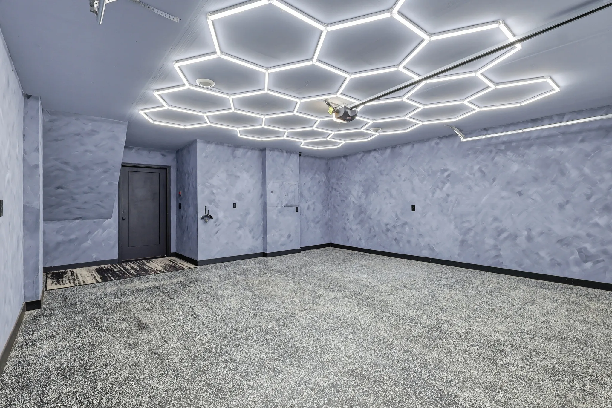 Below grade area featuring baseboards and carpet floors