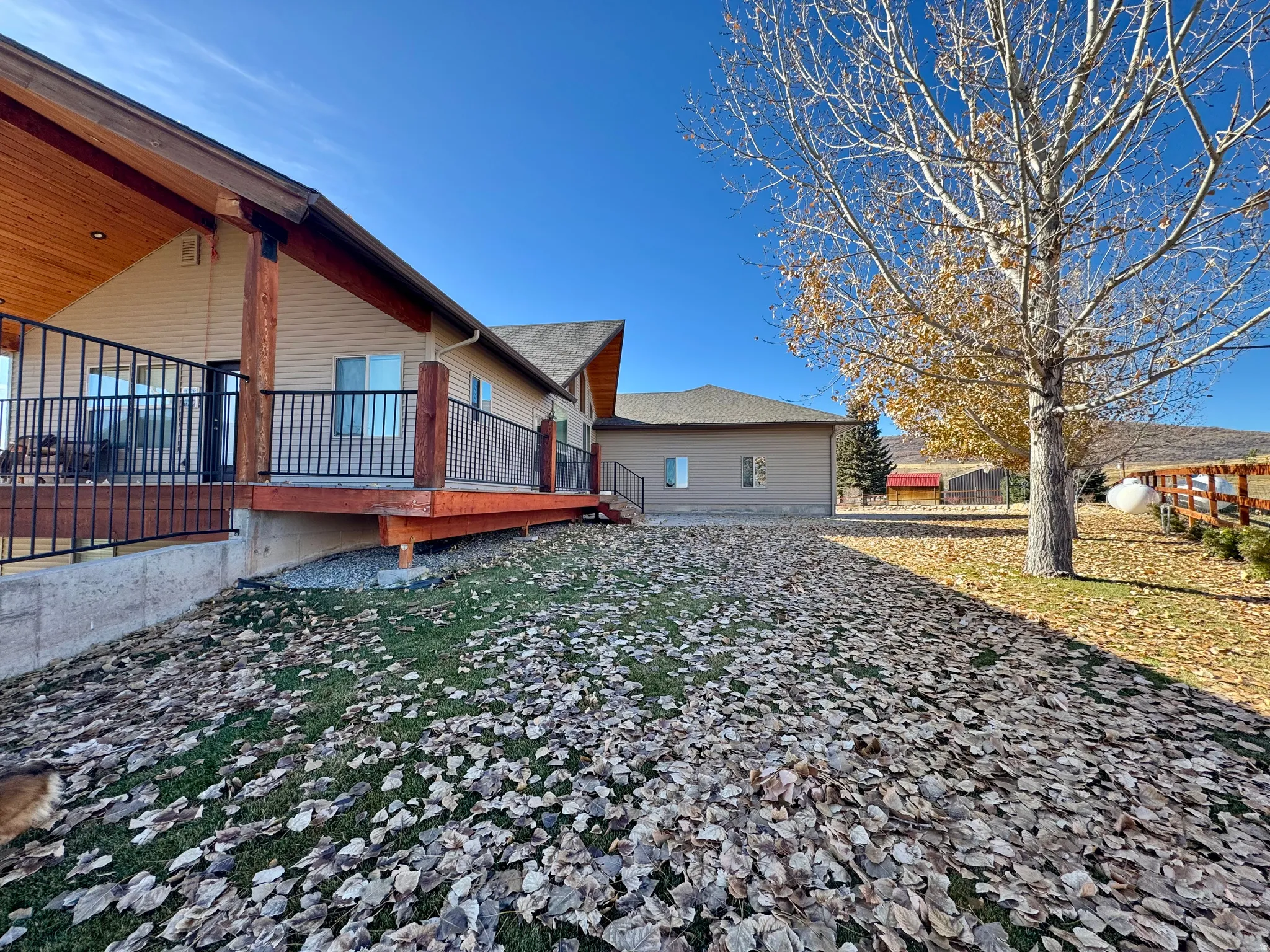 View of yard featuring a wooden deck