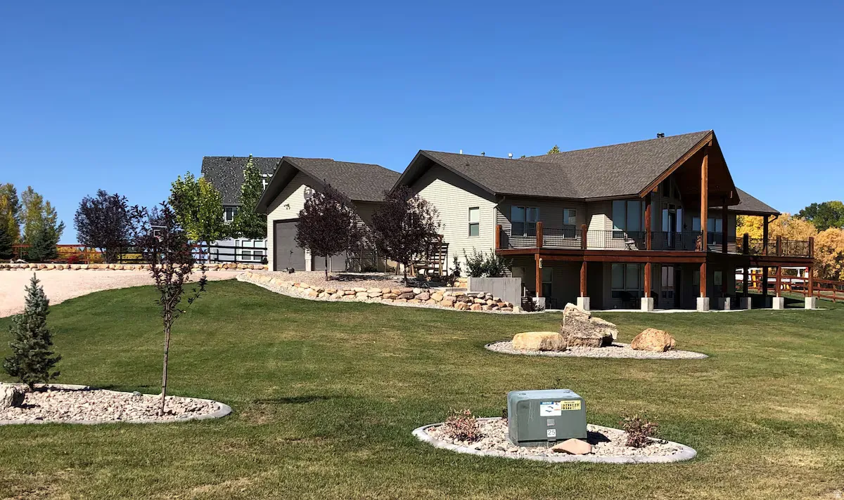View of community with a yard and a fire pit