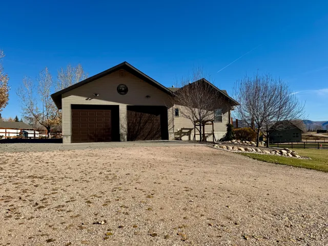 Garage featuring driveway