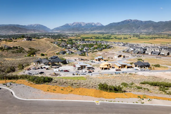 Mountain view featuring nearby suburban area