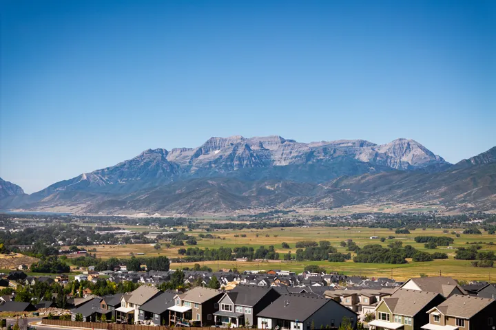 Mountain view featuring nearby suburban area