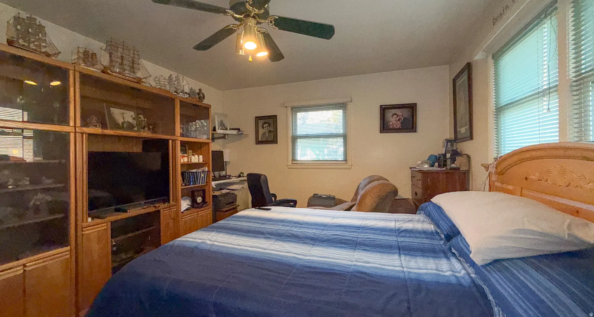 Bedroom with a ceiling fan