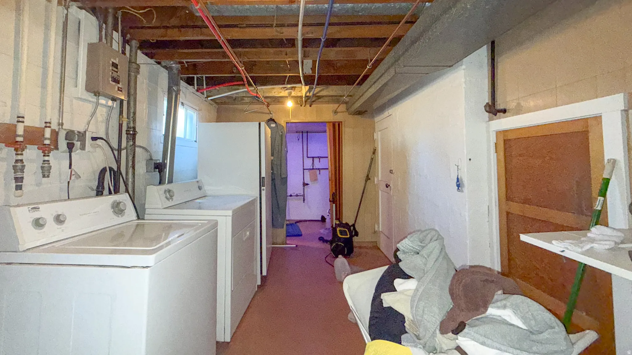 Laundry area featuring washer and clothes dryer