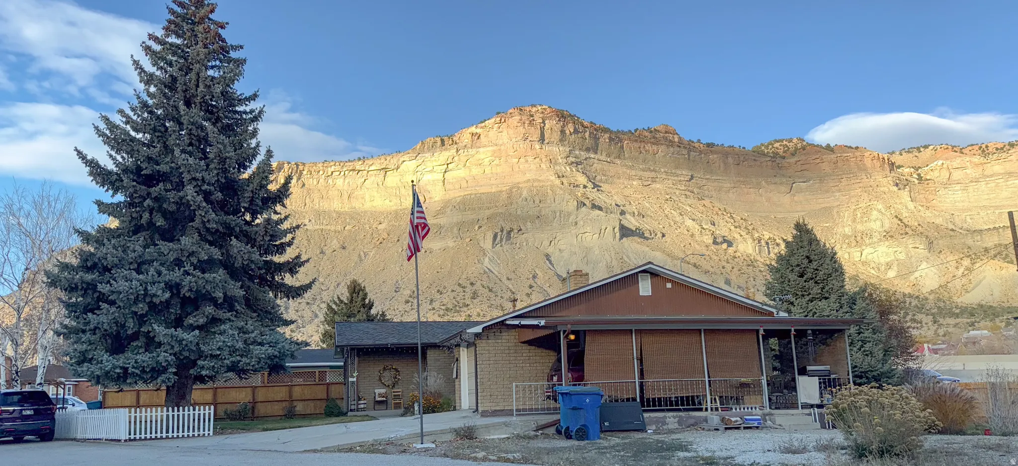 View of front facade with a porch and a mountain view