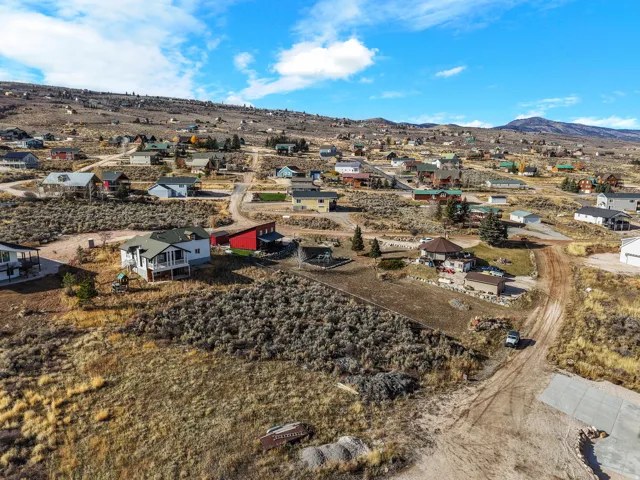 Aerial view of residential area with mountains