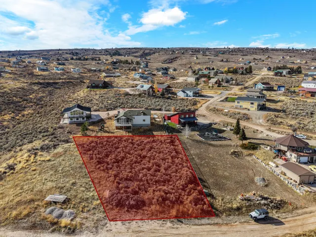 View of rural area with property boundaries highlighted and a desert landscape