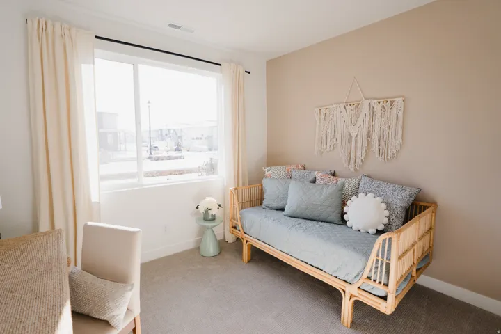 Living area featuring carpet floors and baseboards