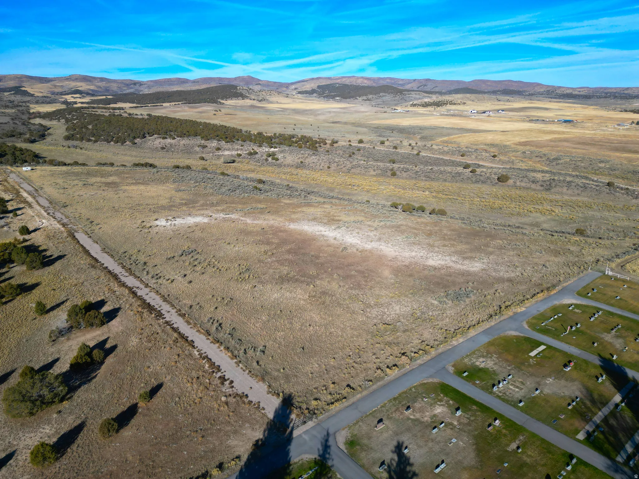 Aerial overview of property's location featuring mountains